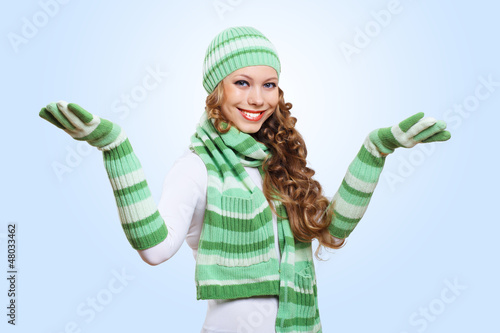 Photo: Young woman wearing warm sweater Young woman wearing warm sweater