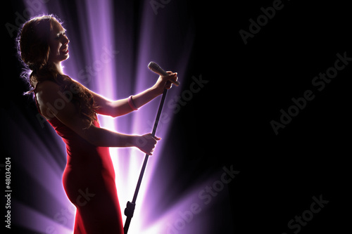 Photo: Female singer on the stage Female singer on the stage