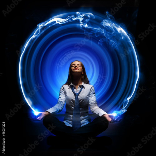 Photo: Business woman meditating Business woman meditating
