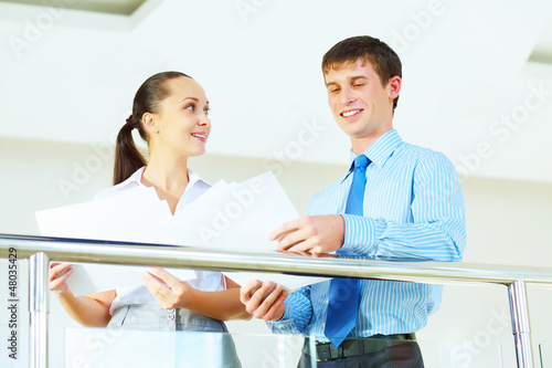 Photo: a portrait of a businesswoman and businessman a portrait of a businesswoman and businessman
