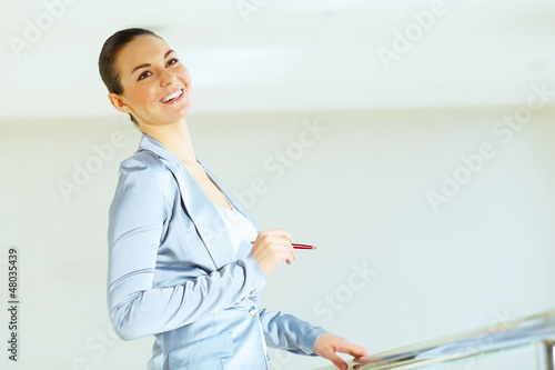 Photo: portrait of a confident young businesswoman portrait of a confident young businesswoman