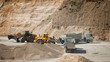 Machines working at gravel pit