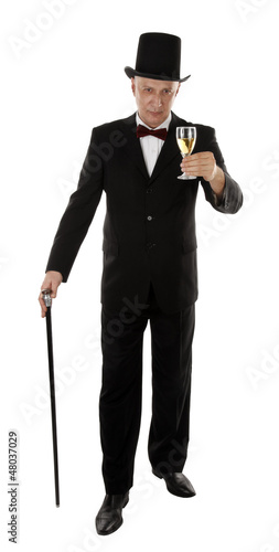 Photo: Rich man is holding glass and toasting Rich man is holding glass and toasting