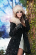 Photo: Winter Girl with beautiful make up, and snow flake, forest back Winter Girl with beautiful make up, and snow flake, forest back