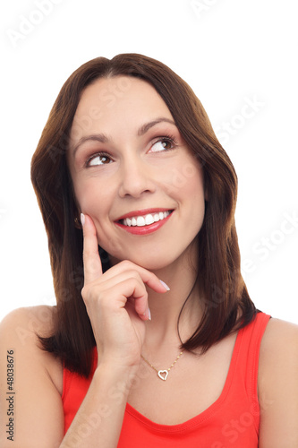 Photo: Woman thinking with finger on chin Woman thinking with finger on chin