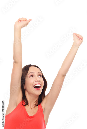 Photo: Excited woman with arms raised Excited woman with arms raised