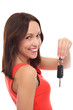 Smiling woman showing car key