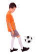 Boy playing with soccer ball, isolated on white background.
