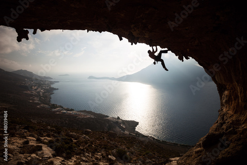 Photo: Silhouette of a rock climber at sunset. Kalymnos Island, Greece. Silhouette of a rock climber at sunset. Kalymnos Island, Greece.