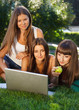 Photo: Happy young student girls outdoors Happy young student girls outdoors