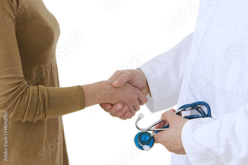 Photo: Poignée de main - Médecin & Patiente Poignée de main - Médecin & Patiente