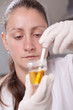 Woman making urine test