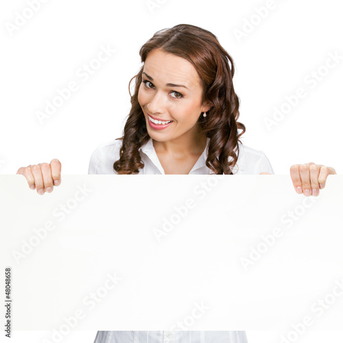 Photo: Businesswoman showing blank signboard, isolated Businesswoman showing blank signboard, isolated