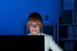 Photo: businesswoman delayed at work until late at night businesswoman delayed at work until late at night