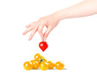 heart background with hand and sherry tomatoes