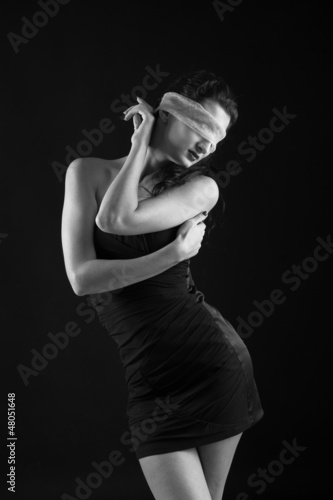 Photo: Portrait of woman constrained by gauze ring on eyes. Portrait of woman constrained by gauze ring on eyes.