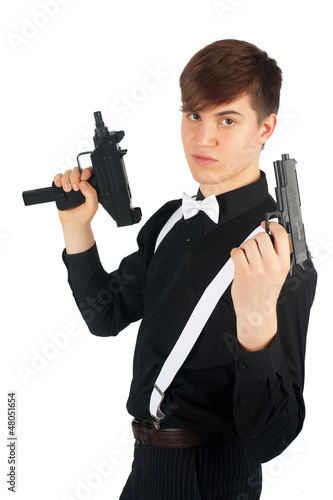 Photo: Young gangster with a gun Young gangster with a gun