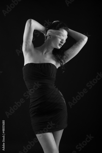 Photo: Portrait of woman constrained by gauze ring on eyes. Portrait of woman constrained by gauze ring on eyes.