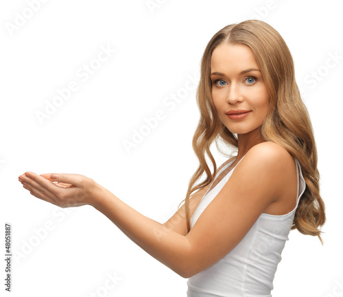 Photo: woman holding something on the palms woman holding something on the palms