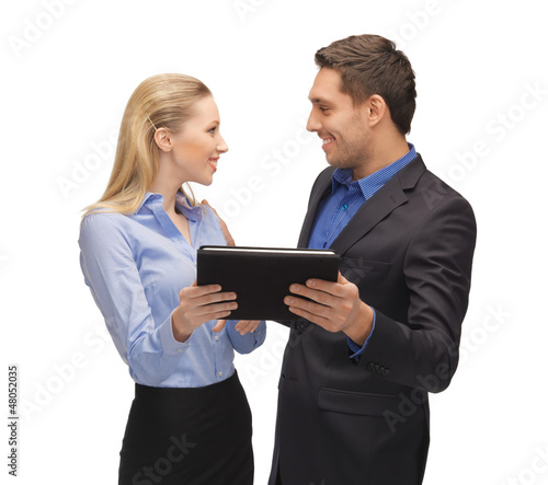 Photo: man and woman with tablet pc man and woman with tablet pc