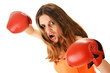 Portrait of young woman with red boxing gloves