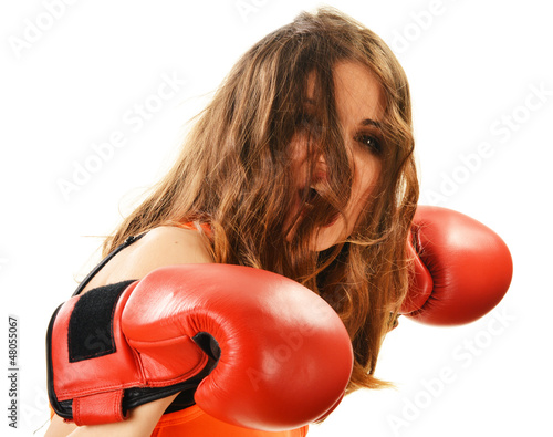 Photo: Portrait of young woman with red boxing gloves Portrait of young woman with red boxing gloves