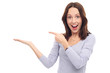 Excited woman pointing at something