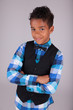Portrait of a cute african american little boy with folded arms