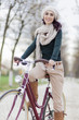 Young woman on the bicycle