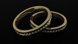 Anillos de boda y fondo negro