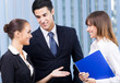 Portrait of three businesspeople at office
