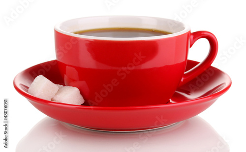 Photo: A red cup of strong coffee isolated on white A red cup of strong coffee isolated on white