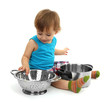 cute little boy with kitchen accessories, isolated on white