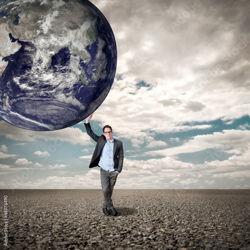 Photo: young man who sustains the world young man who sustains the world