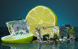 Ice cubes with lime on darck blue background
