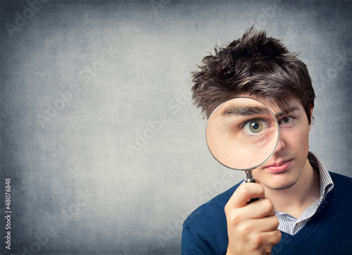 Photo: Young man with lens Young man with lens
