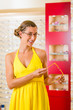 Young woman at optician with glasses