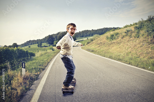 Photo: Child Skateboarding Child Skateboarding