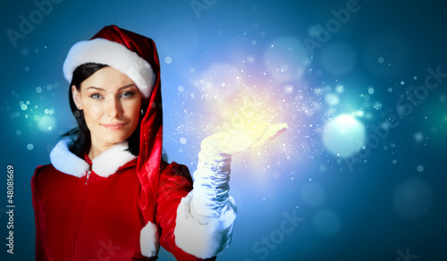 Photo: Portrait of girl wearing santa claus clothes Portrait of girl wearing santa claus clothes