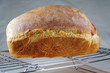 Freshly baked bread cooling on a wire rack