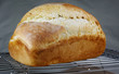 Freshly baked bread cooling on a wire rack