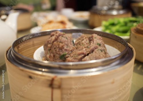Photo: chinese dim sum - meatballs in steamer chinese dim sum - meatballs in steamer
