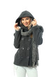 Blonde girl wearing a short gray coat with a long scarf