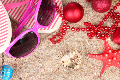 Photo: Christmas balls,seashells andh beach accessories Christmas balls,seashells andh beach accessories