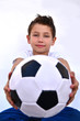 Kind mit fußball