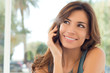 Photo: Young Woman Talking On Cell Phone Young Woman Talking On Cell Phone