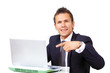 Handsome businessman pointing to computer