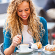 Young Couple Having a Traditional Italian Breakfast