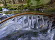 a brook with icicles - early spring
