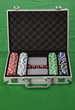 A photo of poker chips and cards in a briefcase